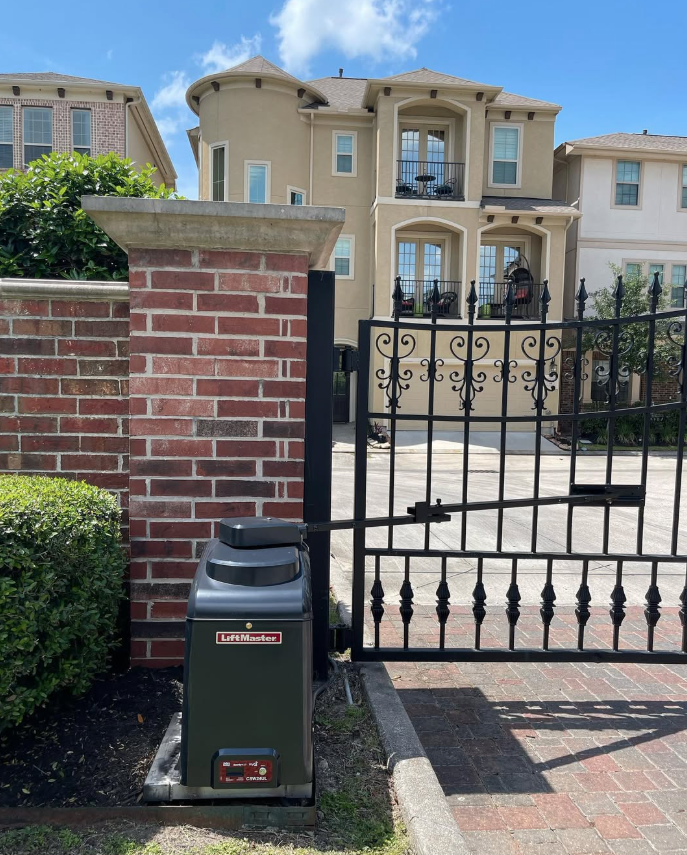 Ornamental iron driveway gate with LiftMaster operator